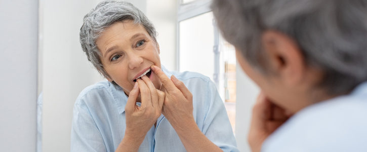 woman flossing