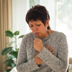 woman coughing