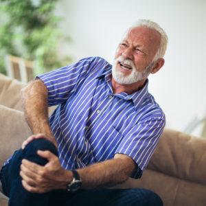 senior man with knee pain