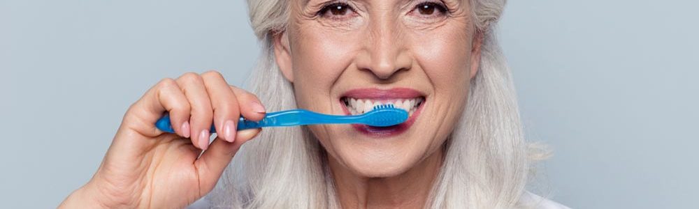 Woman brushing teeth